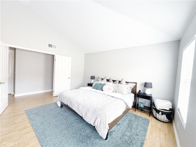 4 Imperial Aisle, Irvine, CA 92606 - bedroom featuring light wood finished floors and high vaulted ceiling