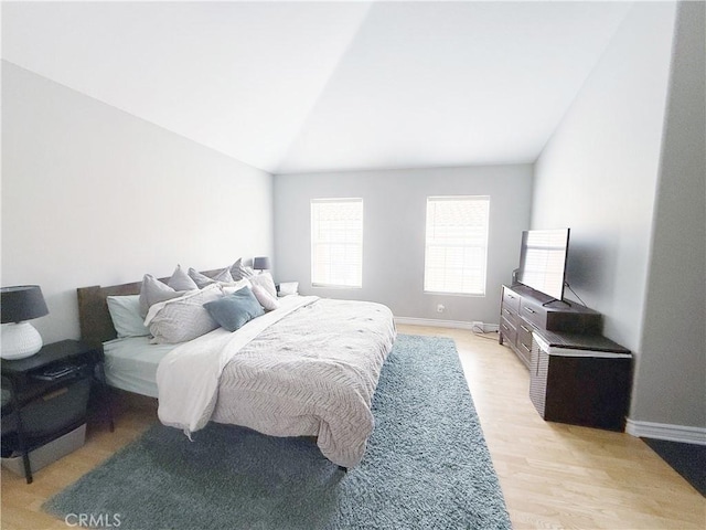 4 Imperial Aisle, Irvine, CA 92606 - bedroom featuring lofted ceiling and light wood-style flooring