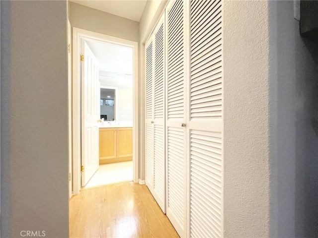 4 Imperial Aisle, Irvine, CA 92606 - corridor featuring light wood-type flooring and a textured wall
