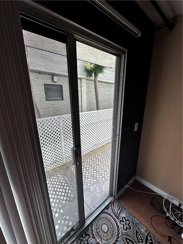 605 N Louise St Unit 106, Glendale, CA 91206 - doorway to outside with wood finished floors and baseboards