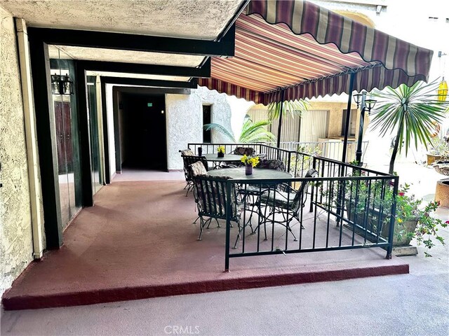 605 N Louise St Unit 106, Glendale, CA 91206 - view of patio / terrace featuring outdoor dining space