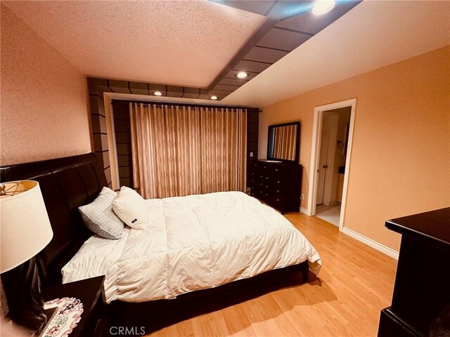 605 N Louise St Unit 106, Glendale, CA 91206 - bedroom with wood finished floors and recessed lighting
