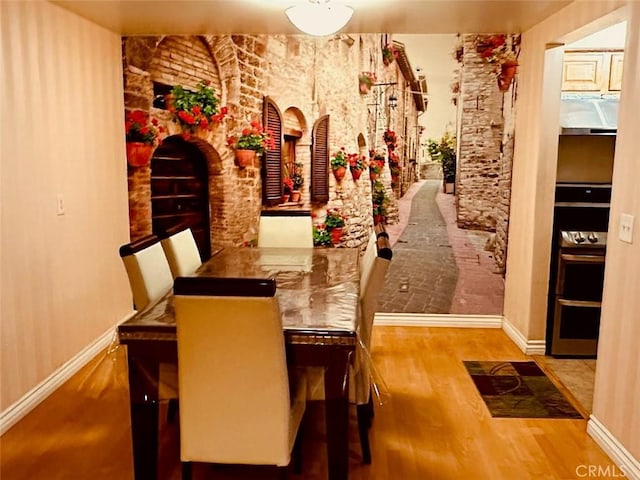 605 N Louise St Unit 106, Glendale, CA 91206 - dining area featuring wood finished floors