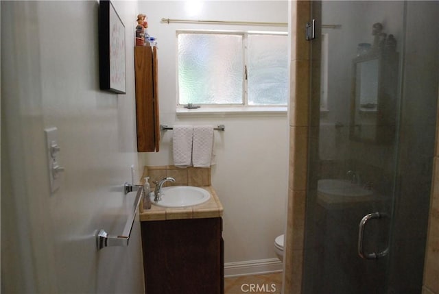 360 Campbell Ave, Redlands, CA 92373 - full bathroom featuring vanity, a shower stall, toilet, and baseboards