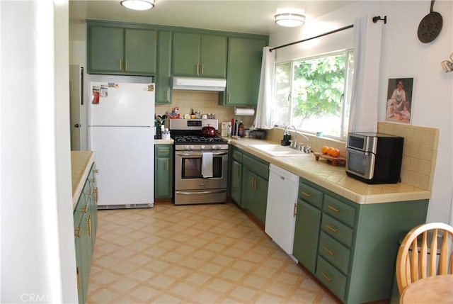 360 Campbell Ave, Redlands, CA 92373 - kitchen featuring green cabinets, white appliances, under cabinet range hood, a sink, and light flooring