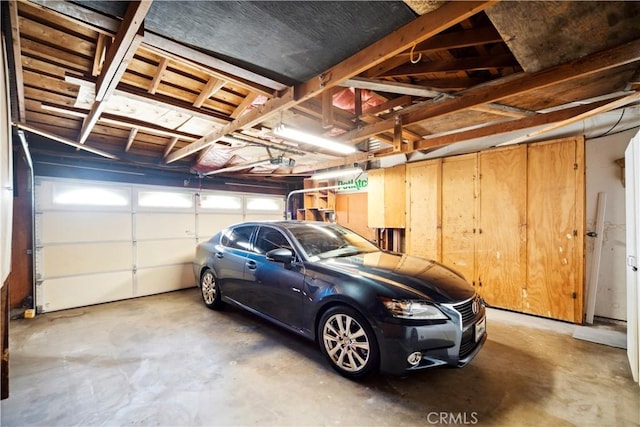 663 Redwood Ave, Upland, CA 91786 - garage with a garage door opener