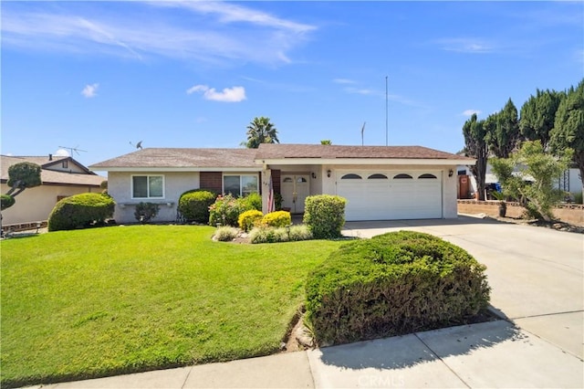 663 Redwood Ave, Upland, CA 91786 - ranch-style home featuring driveway, stucco siding, a garage, and a front yard
