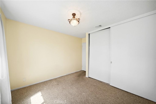 663 Redwood Ave, Upland, CA 91786 - unfurnished bedroom featuring carpet flooring and a closet