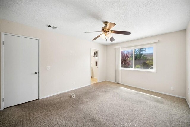 663 Redwood Ave, Upland, CA 91786 - empty room featuring ceiling fan, a textured ceiling, carpet floors, and baseboards