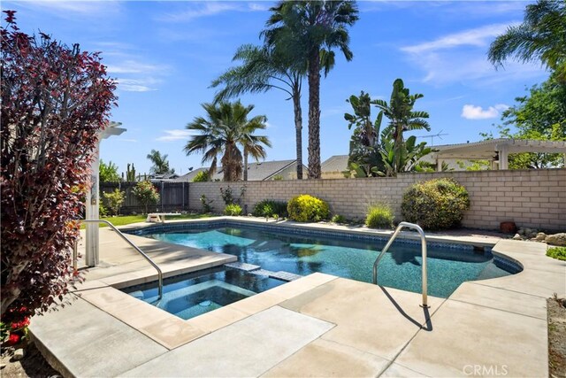 663 Redwood Ave, Upland, CA 91786 - view of swimming pool featuring an in-ground hot tub, a fenced backyard, and a patio area
