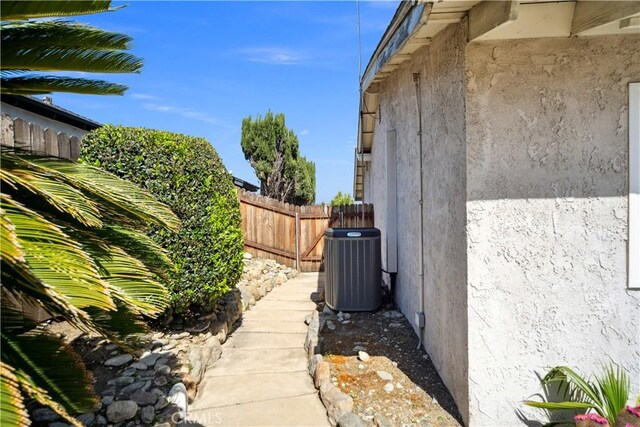 663 Redwood Ave, Upland, CA 91786 - view of property exterior with central AC unit and stucco siding