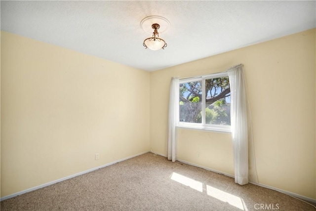 663 Redwood Ave, Upland, CA 91786 - empty room featuring light carpet and baseboards
