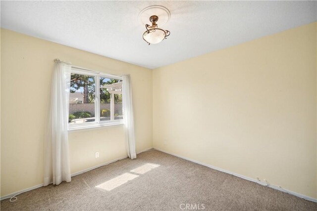 663 Redwood Ave, Upland, CA 91786 - unfurnished room featuring carpet flooring and baseboards