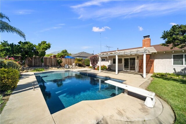 663 Redwood Ave, Upland, CA 91786 - view of swimming pool with a pergola, a fenced backyard, a diving board, and a patio