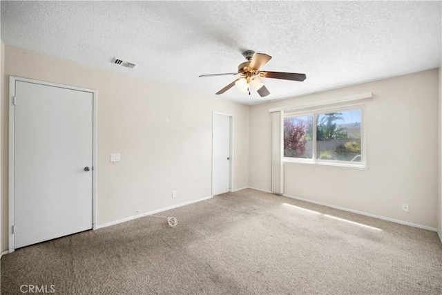 663 Redwood Ave, Upland, CA 91786 - unfurnished bedroom featuring a textured ceiling, carpet flooring, baseboards, and ceiling fan