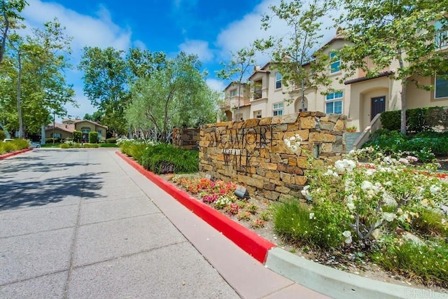 14676 Via Fiesta Unit 2, San Diego, CA 92127 - view of concrete road with curbs and a residential view