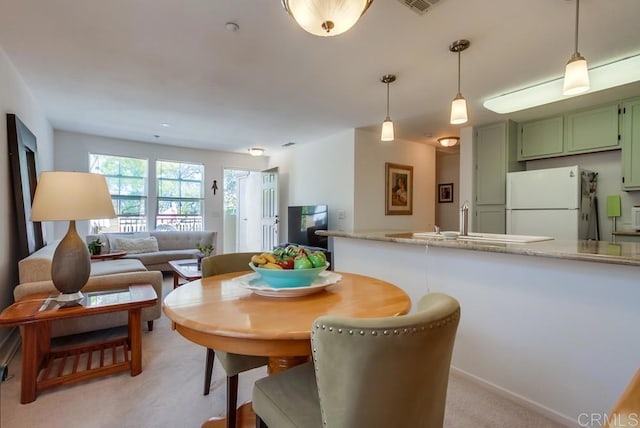 14676 Via Fiesta Unit 2, San Diego, CA 92127 - dining room featuring light carpet