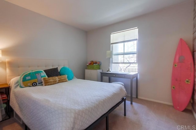 14676 Via Fiesta Unit 2, San Diego, CA 92127 - bedroom with baseboards and light colored carpet