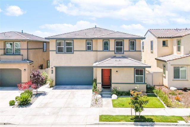 18106 Meridian Ln, Saugus, CA 91350 - view of front of property featuring concrete driveway, an attached garage, stucco siding, and a tile roof