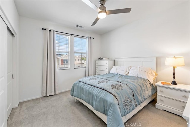 18106 Meridian Ln, Saugus, CA 91350 - bedroom featuring light carpet, a closet, a ceiling fan, and baseboards