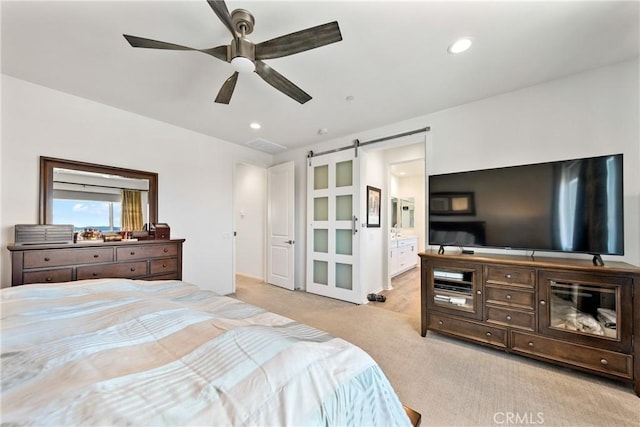 18106 Meridian Ln, Saugus, CA 91350 - bedroom featuring light carpet, a barn door, a ceiling fan, connected bathroom, and recessed lighting