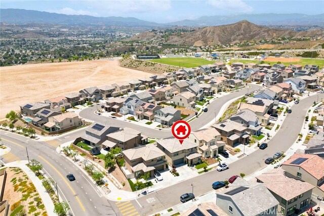 18106 Meridian Ln, Saugus, CA 91350 - aerial view of property's location with nearby suburban area and a mountain backdrop