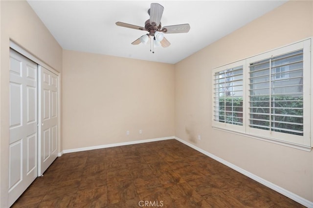 5675 W Overlook Dr, Rancho Cucamonga, CA 91739 - unfurnished bedroom with baseboards, a closet, and ceiling fan