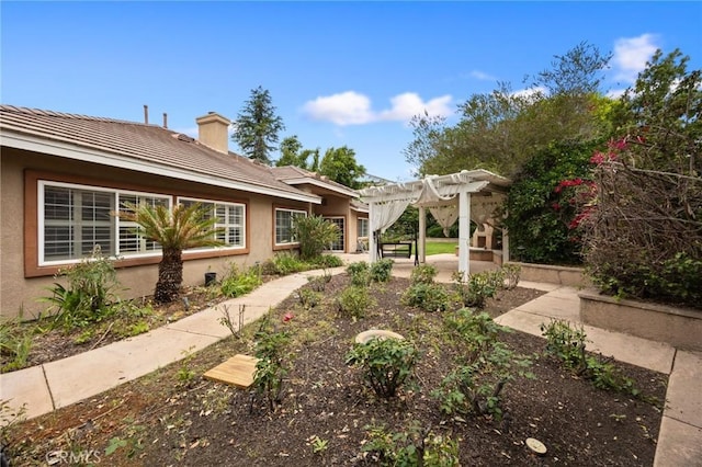 5675 W Overlook Dr, Rancho Cucamonga, CA 91739 - view of yard featuring a pergola and a patio area