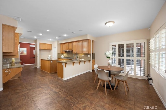 5675 W Overlook Dr, Rancho Cucamonga, CA 91739 - dining space with plenty of natural light, baseboards, and recessed lighting
