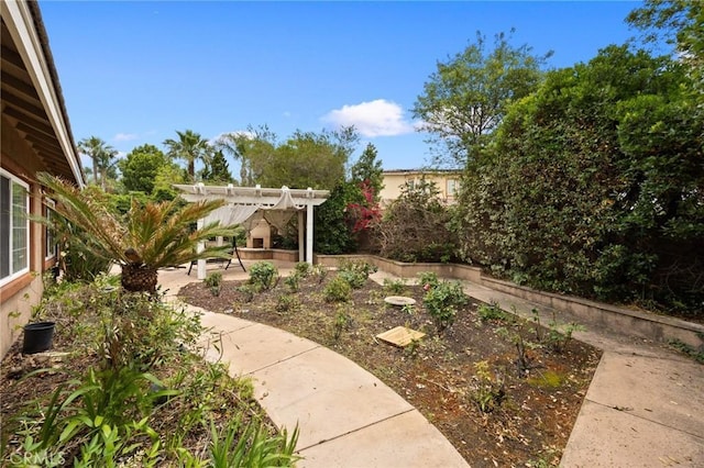 5675 W Overlook Dr, Rancho Cucamonga, CA 91739 - view of yard with a patio area and a pergola