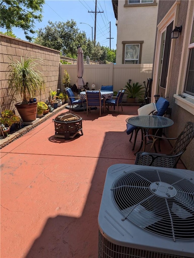 753 Huron Pl, Claremont, CA 91711 - view of patio / terrace with central AC, an outdoor fire pit, and outdoor dining space