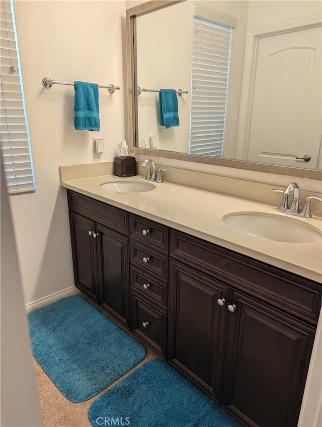 753 Huron Pl, Claremont, CA 91711 - full bathroom featuring double vanity and baseboards