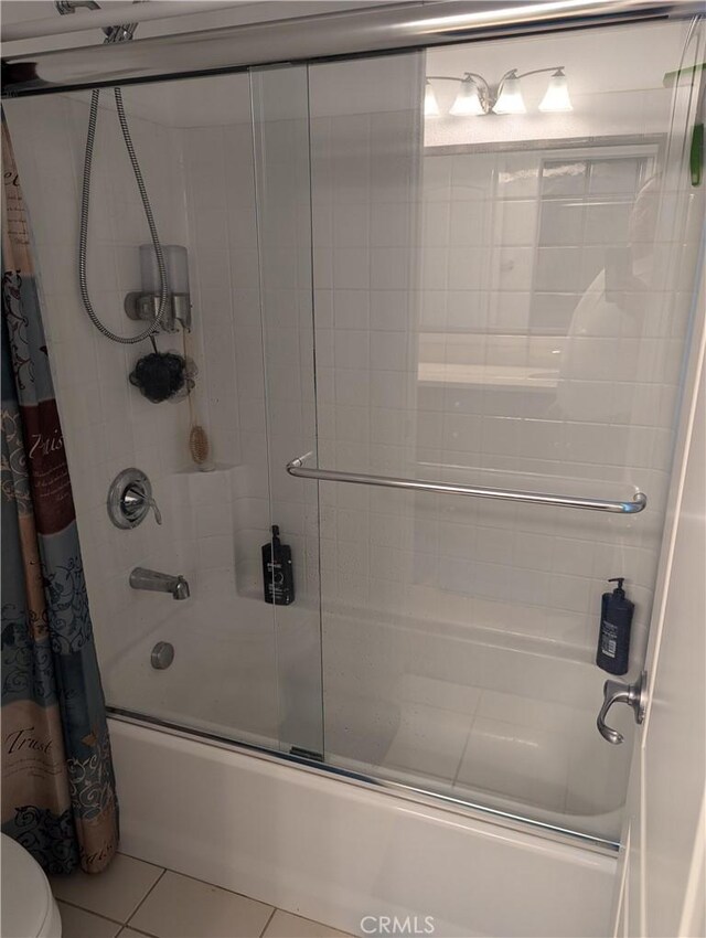 753 Huron Pl, Claremont, CA 91711 - full bath featuring combined bath / shower with glass door, tile patterned floors, and toilet