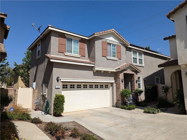 753 Huron Pl, Claremont, CA 91711 - view of front of house with stucco siding, an attached garage, concrete driveway, and a tiled roof