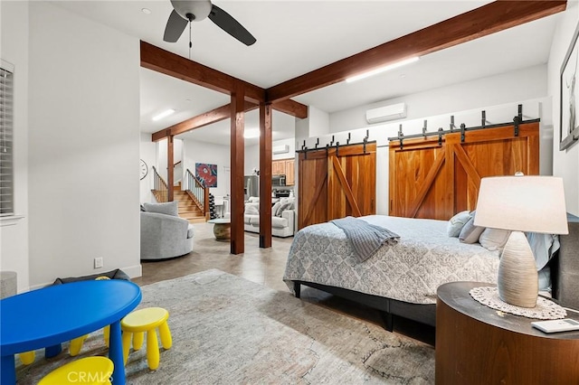 133 Valley Ridge Dr, Paradise, CA 95969 - bedroom featuring beam ceiling, a barn door, an AC wall unit, and tile patterned floors