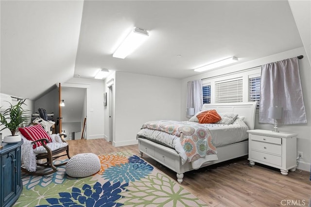 133 Valley Ridge Dr, Paradise, CA 95969 - bedroom featuring light wood-style floors and vaulted ceiling