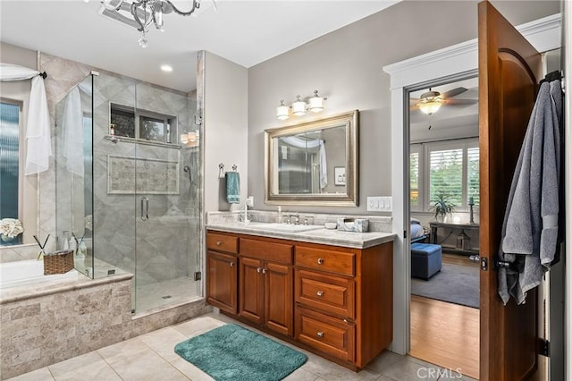 133 Valley Ridge Dr, Paradise, CA 95969 - full bathroom featuring tile patterned floors, vanity, a stall shower, and a bath