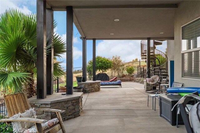 133 Valley Ridge Dr, Paradise, CA 95969 - view of patio / terrace featuring stairway and a fire pit
