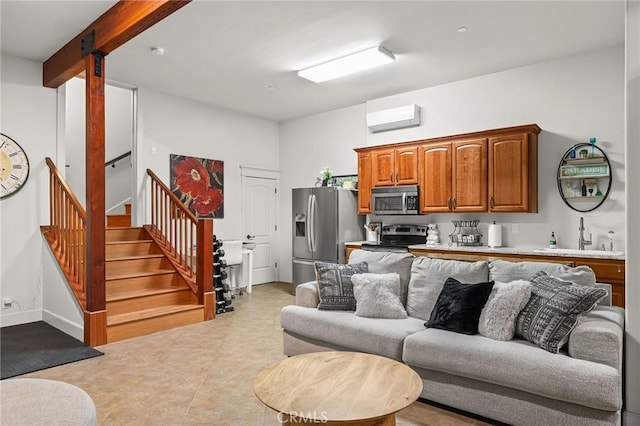 133 Valley Ridge Dr, Paradise, CA 95969 - living room featuring stairs and a wall mounted air conditioner