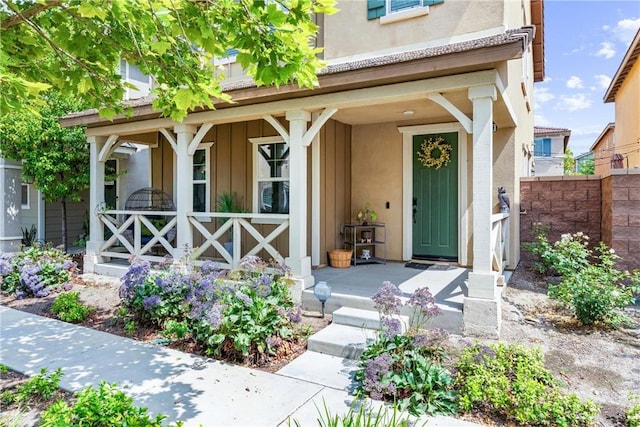 7469 Brahman Ln, Chino, CA 91708 - doorway to property featuring a porch and stucco siding