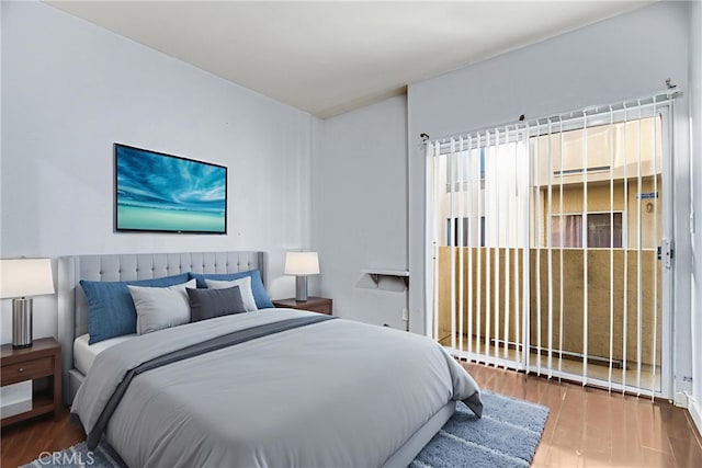19350 Sherman Way Unit 223, Reseda, CA 91335 - bedroom with wood finished floors