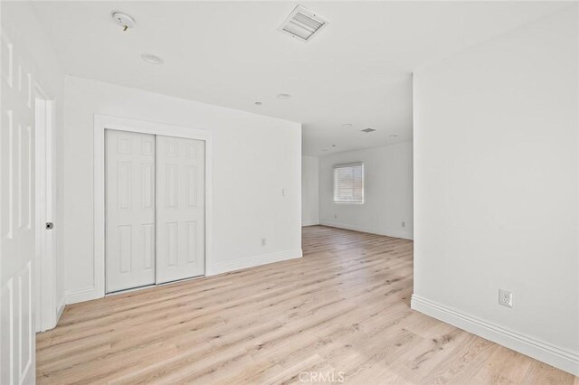 941 E 97th St, Los Angeles, CA 90002 - interior space with light wood-style flooring and baseboards