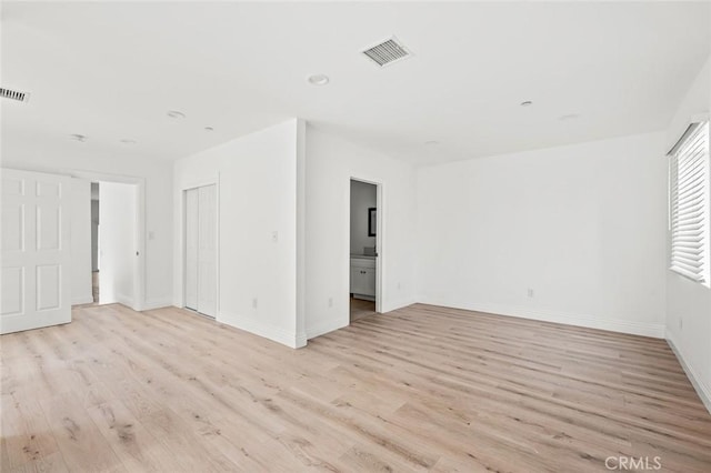 941 E 97th St, Los Angeles, CA 90002 - empty room featuring light wood-style flooring, baseboards, and recessed lighting