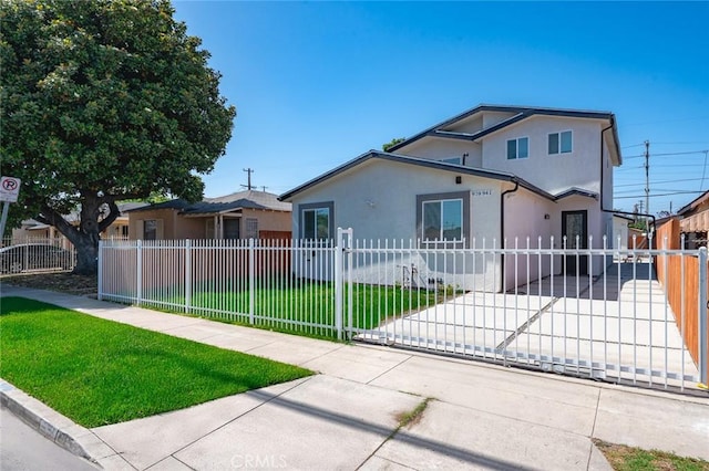 941 E 97th St, Los Angeles, CA 90002 - view of front of property featuring stucco siding and concrete driveway
