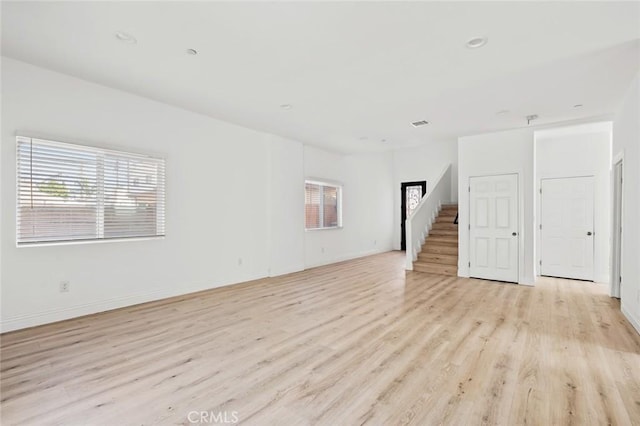 941 E 97th St, Los Angeles, CA 90002 - unfurnished room with light wood finished floors and baseboards