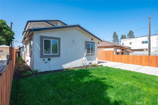 941 E 97th St, Los Angeles, CA 90002 - view of home's exterior with stucco siding