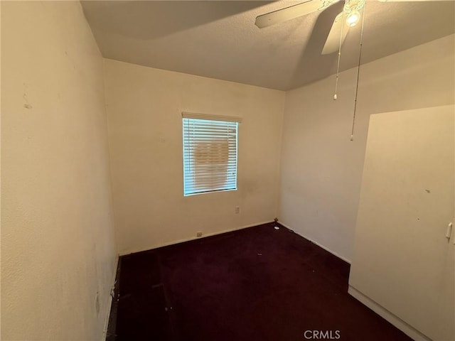 431 W M St, Colton, CA 92324 - empty room with dark carpet and ceiling fan