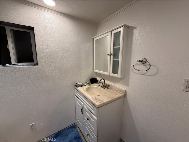 431 W M St, Colton, CA 92324 - bathroom featuring vanity and crown molding