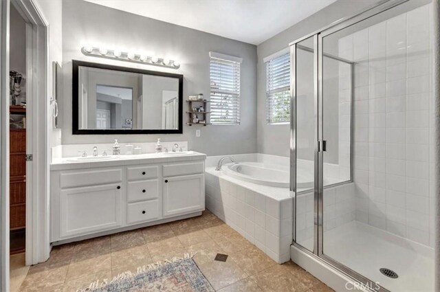 8 Marston Ln, Ladera Ranch, CA 92694 - bathroom with double vanity, a shower stall, a bath, and tile patterned flooring