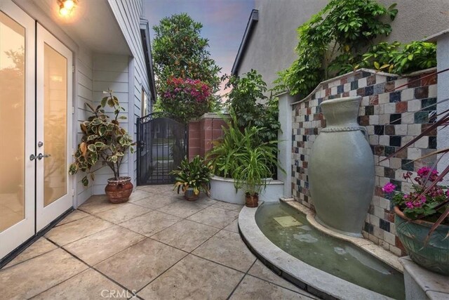 8 Marston Ln, Ladera Ranch, CA 92694 - view of patio / terrace with french doors and a gate